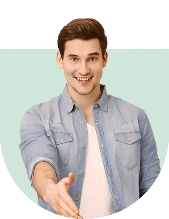 A man smiling and giving a thumbs up gesture, expressing approval or encouragement to someone nearby.